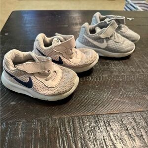 2 pairs of 5C Nike Sneakers